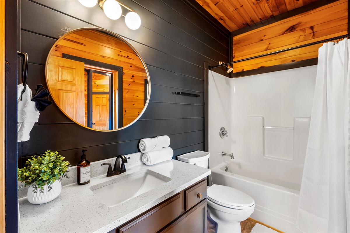 Bedroom 3 has a private bathroom with shower/tub