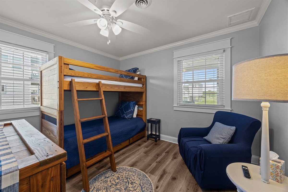 An additional kid-friendly room with a twin bunk and a pull-out trundle