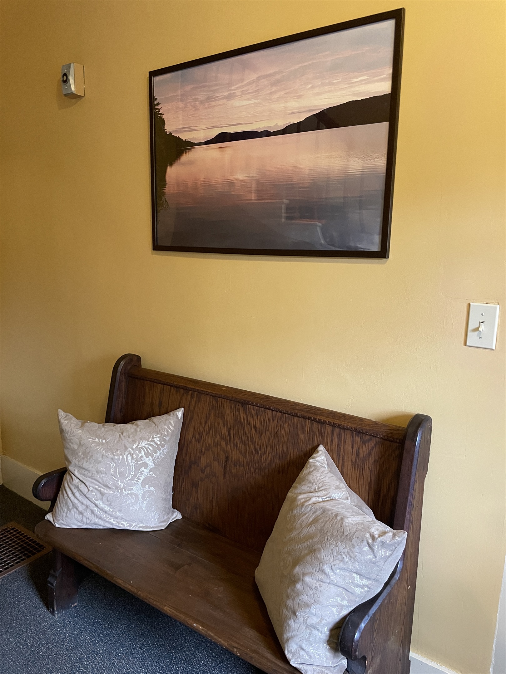 Seating area at the bottom of the stairs
