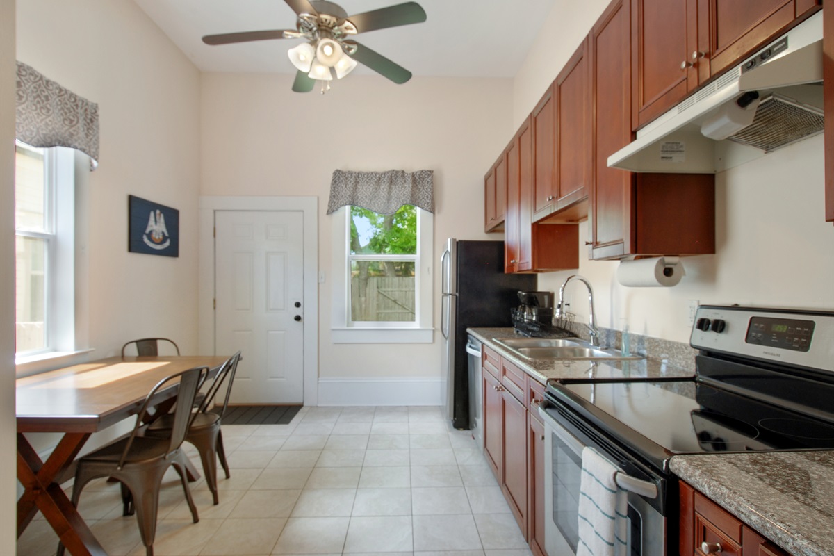 Full kitchen.  Door to backyard.  Laundry in closet to side.