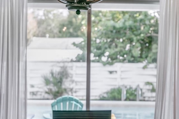 Savor a Meal while Watching the Pool Fun