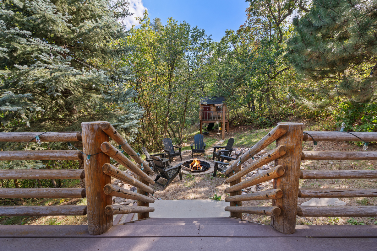 Fire pit area located just below the deck for easy evenings under the stars.