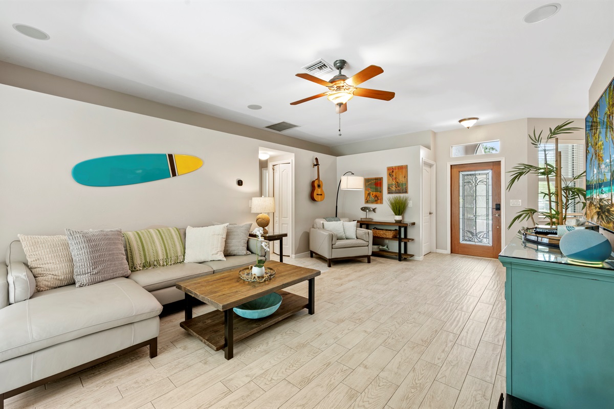 Relaxed coastal décor and comfy seating to instantly shift into vacation mode