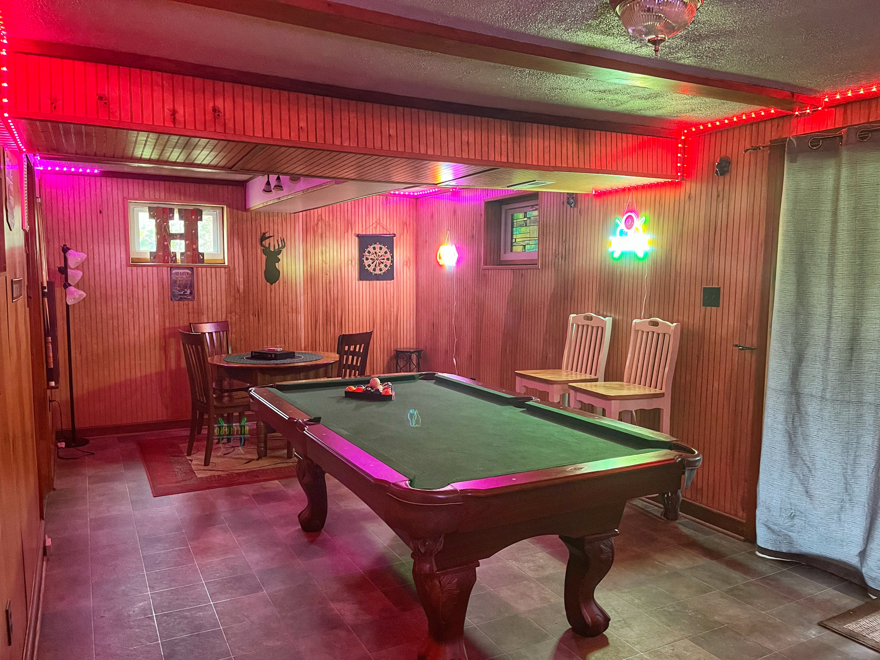 Relax downstairs with a game of pool or gather around the game table for cards, board games, or puzzles—the perfect spot to unwind after a day at the river.
