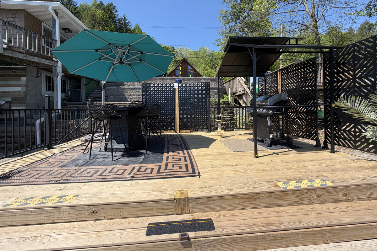 Waterfront deck with seating and grill station