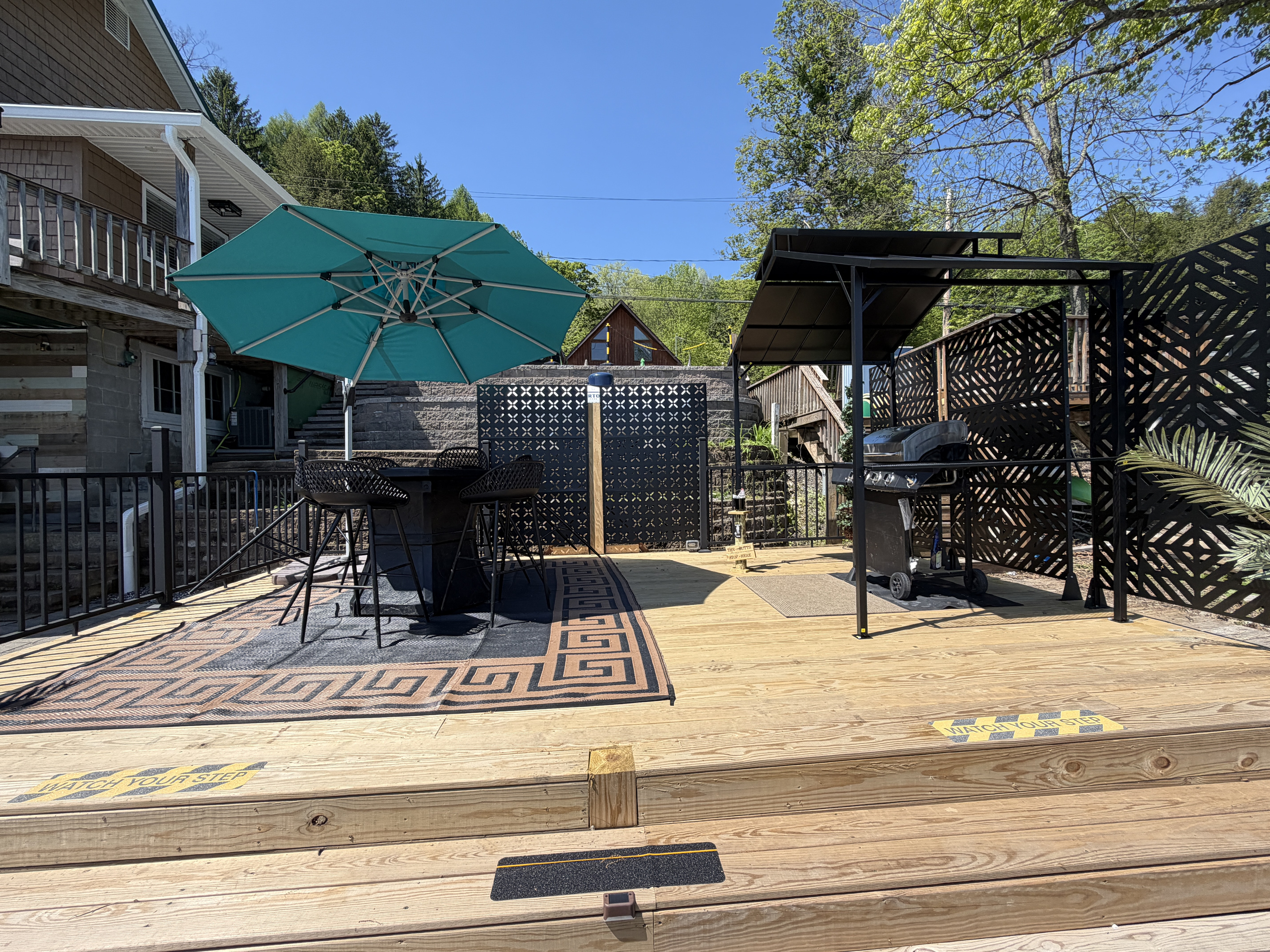 Waterfront deck with seating and grill station