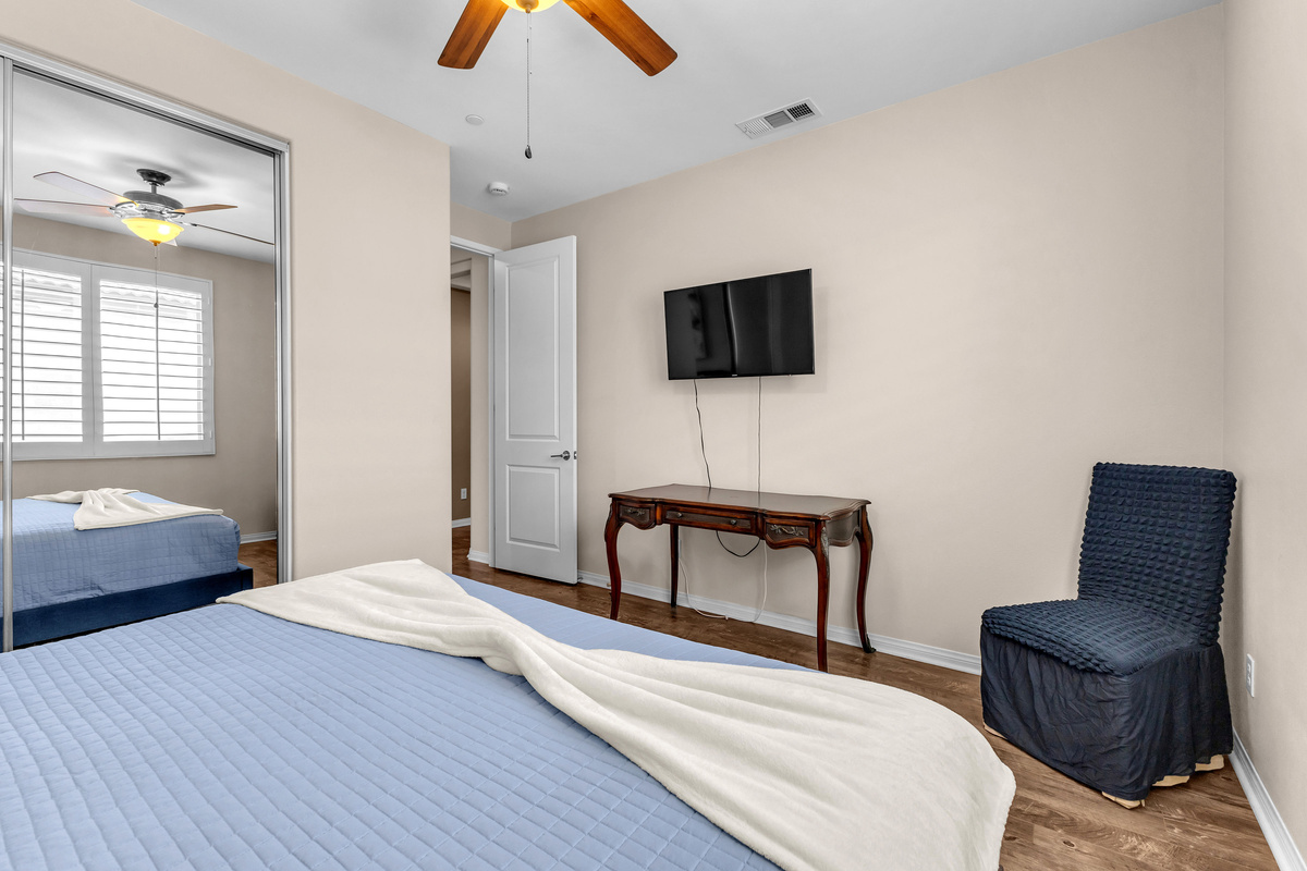 Bedroom with work desk