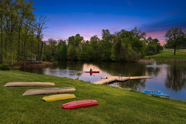 Pond with included boats. A new Jon boat with an electric trolling motor has been added since this photo.