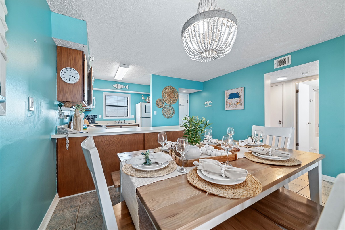 Gather, eat, and make memories. Our spacious dining area and adjacent breakfast bar provide plenty of room for guests to enjoy meals and conversations, creating the perfect setting for your vacation.