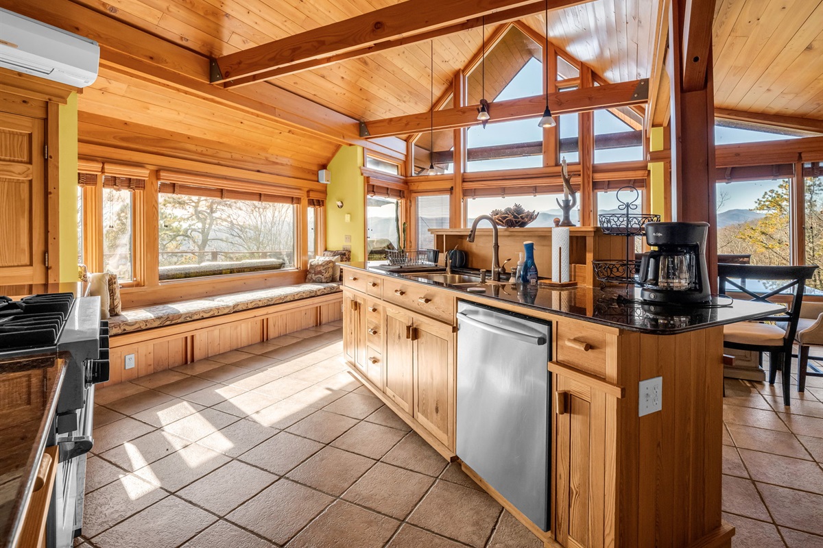 Well appointed gourmet kitchen and seating with long range views.