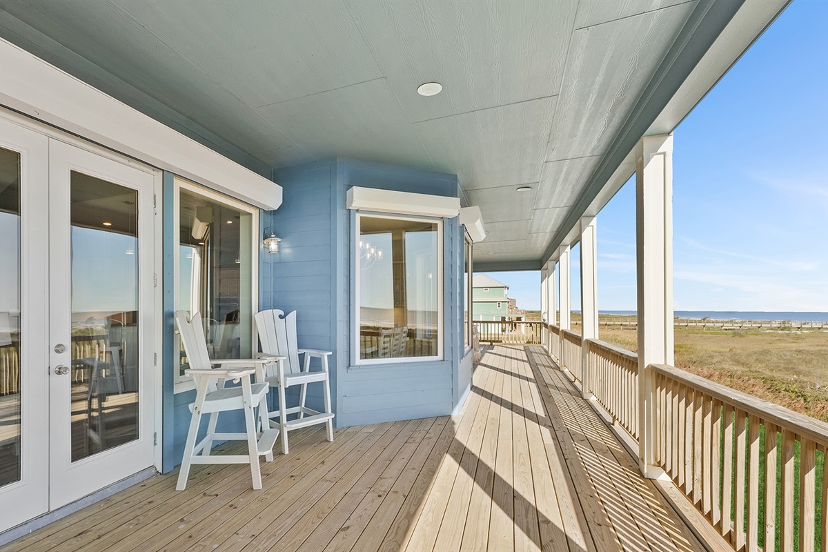 Imagine your morning coffee or evening cocktails on this spectacular wraparound deck with panoramic beach views.