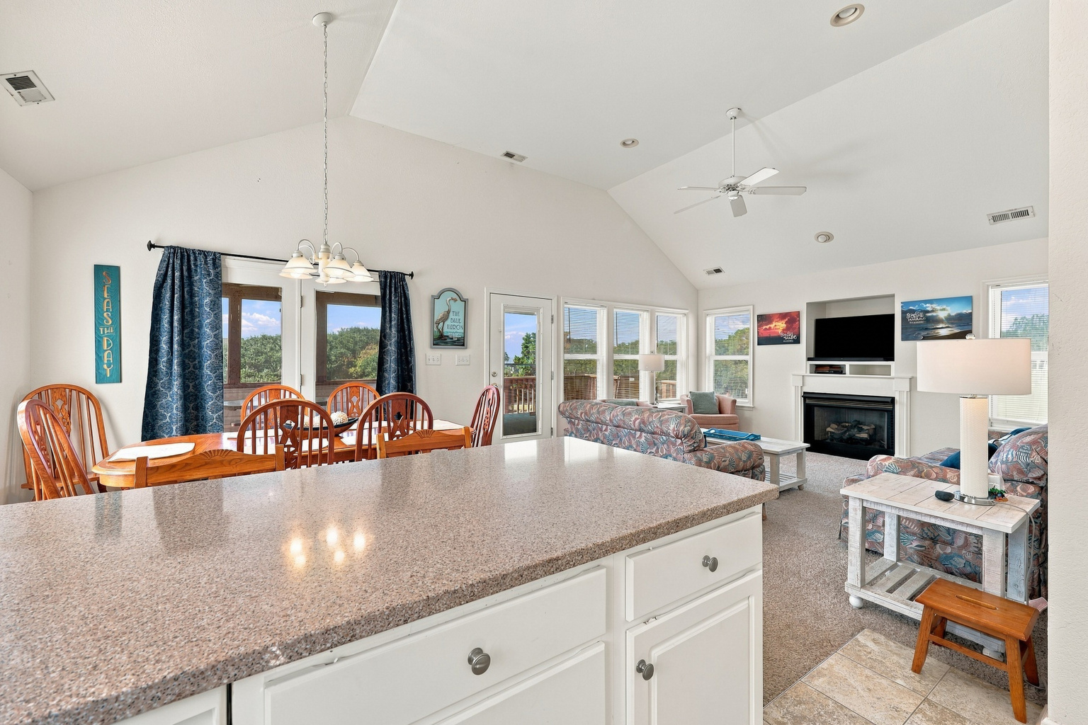 Whip up beach-day breakfasts in the bright white kitchen, with bar seating for your sous chefs.