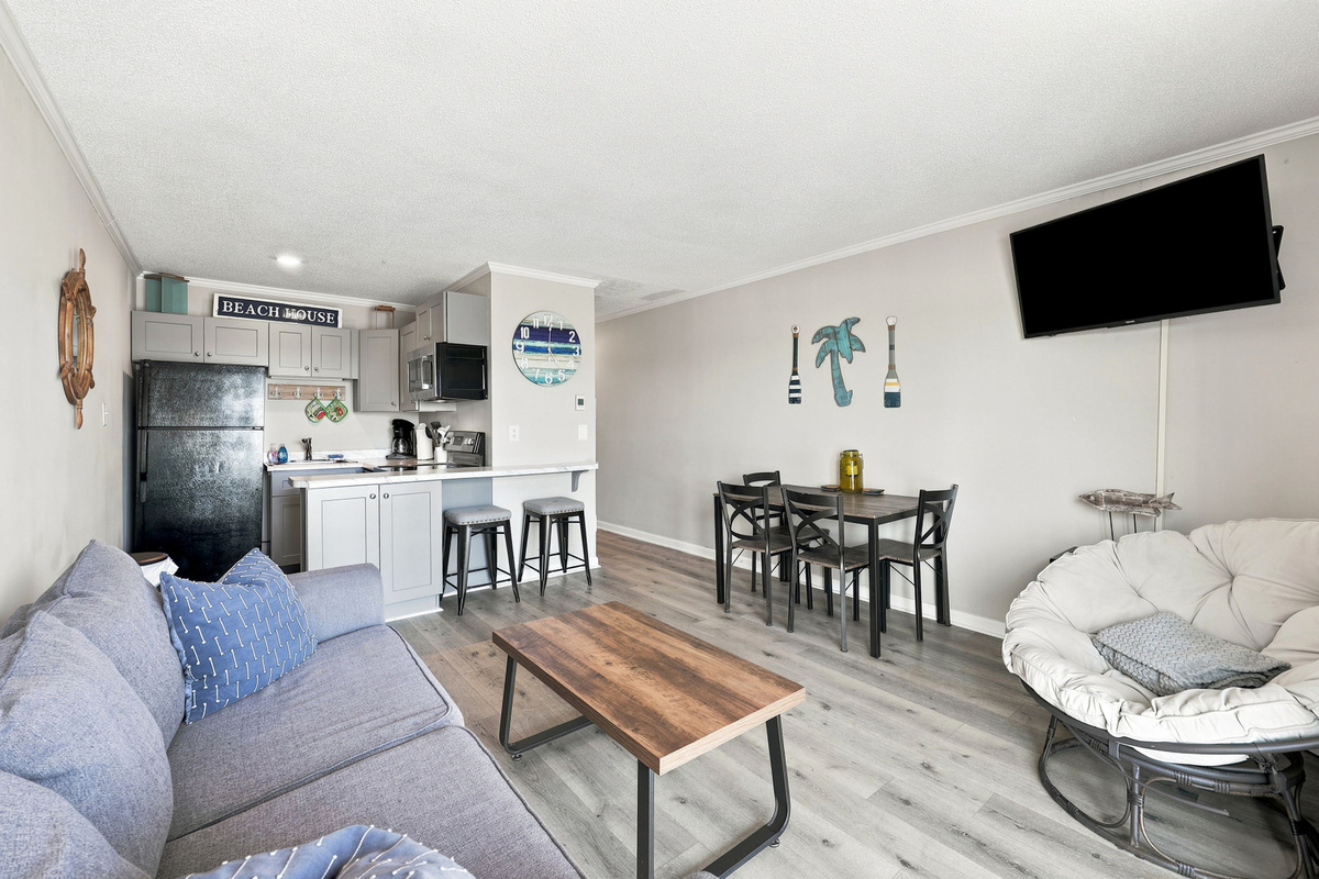 From the inviting sofa to the ocean views beyond, every corner of this condo is designed for comfort and relaxation