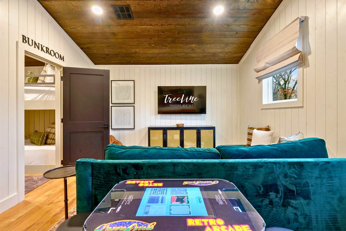 Another look shows the colorful seating and playful touches that make this space perfect for downtime.