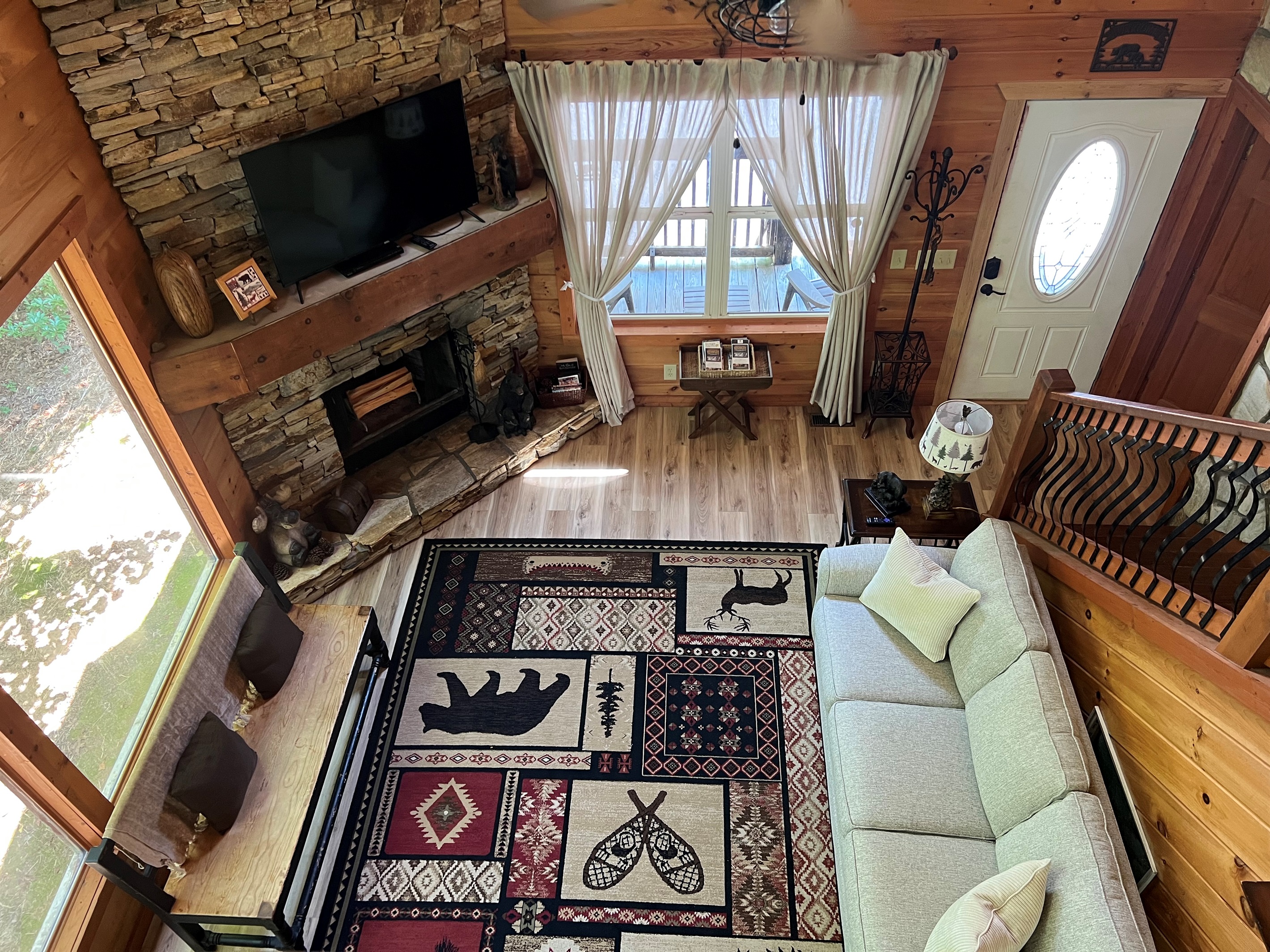 Breathe in the space — high ceilings, warm wood, and a      fire that feels like home.”