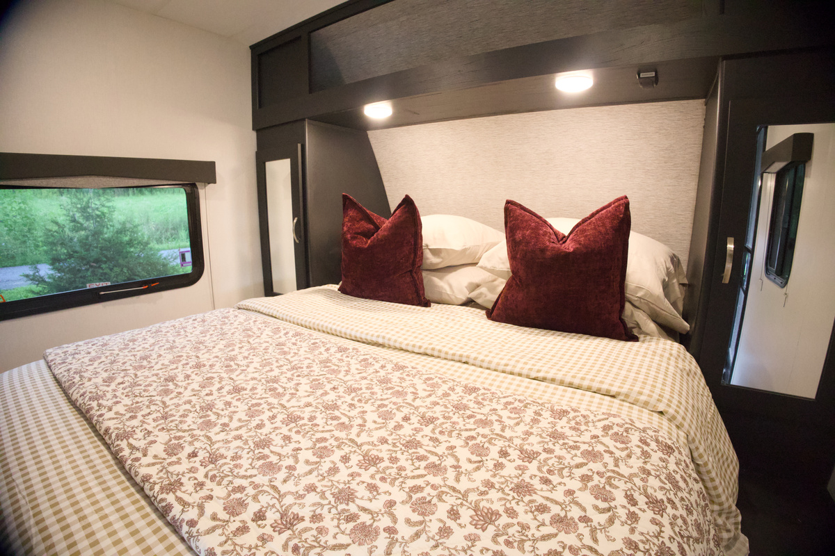 Primary bed. Open those windows for the best white noise you ever did hear. Sweet Dreams!