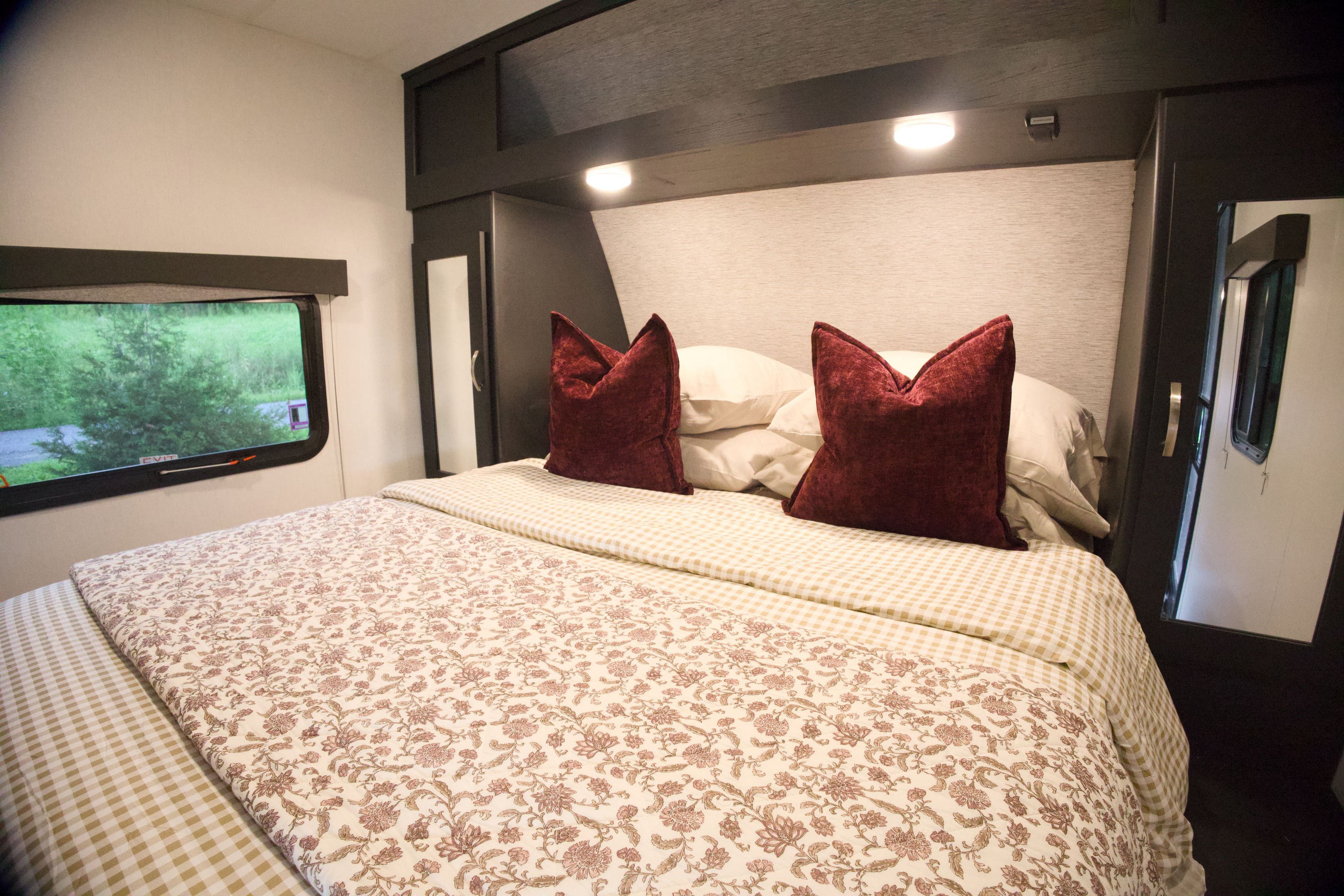 Primary bed. Open those windows for the best white noise you ever did hear. Sweet Dreams!