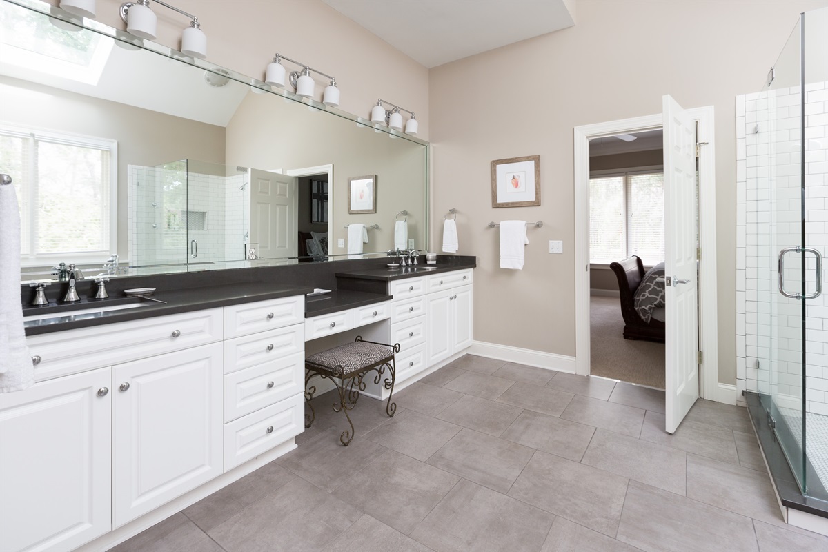Primary bath double vanity featuring beautiful quartz counter tops