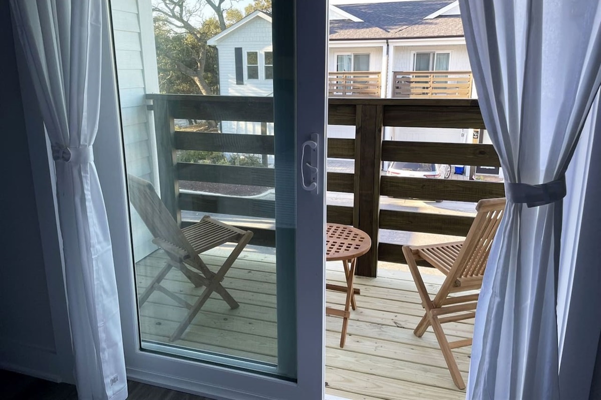 Step outside and enjoy your own quiet balcony retreat just off the primary suite.