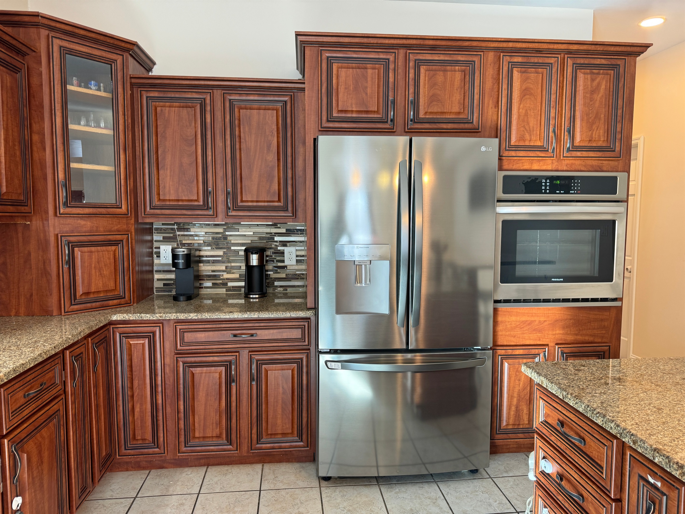 Beautiful cabinetry and stainless appliances in kitchen