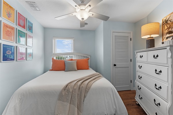 Upstairs Bedroom #2 with queen bed, dresser and closet
