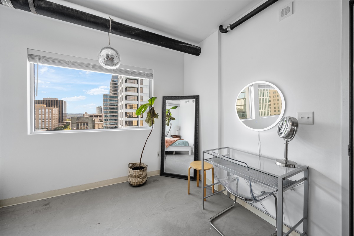 Additional desk and mirrors.