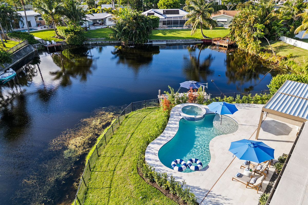Located on a quiet waterfront lot, the property provides easy access to everything while feeling worlds away.