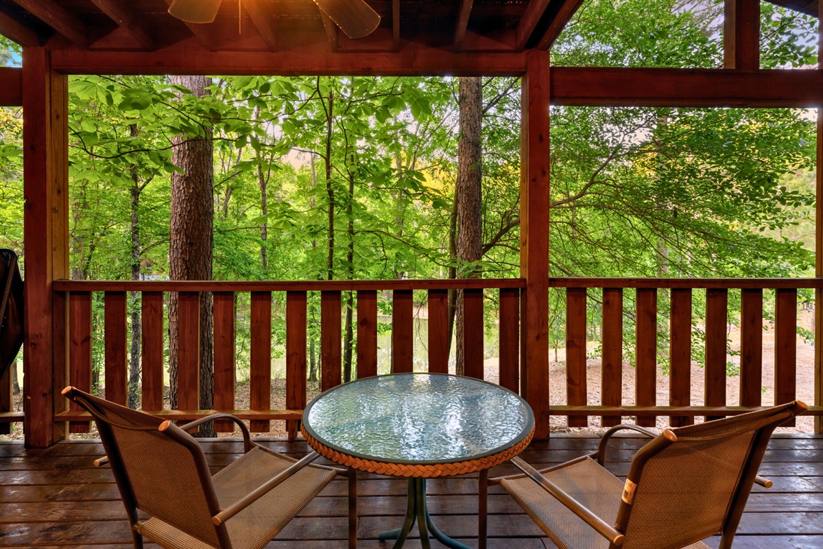 Peaceful deck seating with woodland views all around.