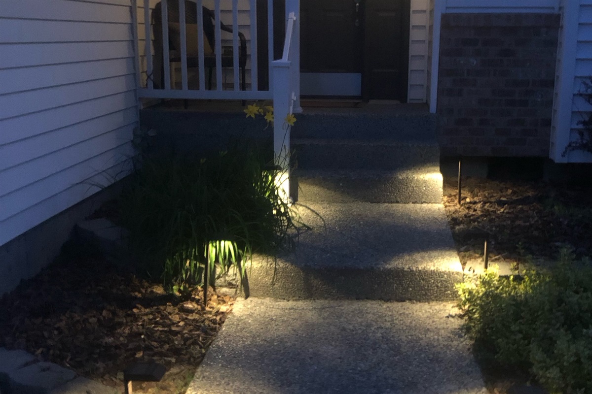 lighted pathway to front door entrance.