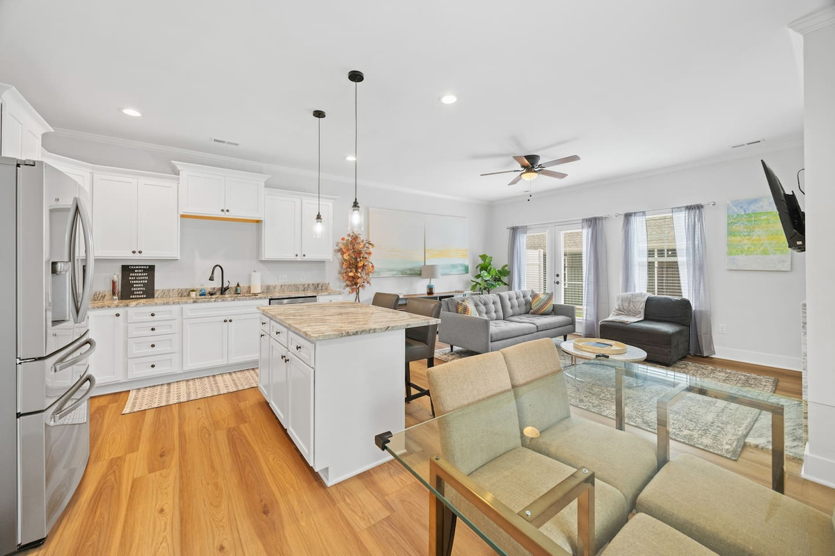 njoy seamless connection between the dining space and the kitchen — perfect for entertaining or family dinners in a warm, modern setting.