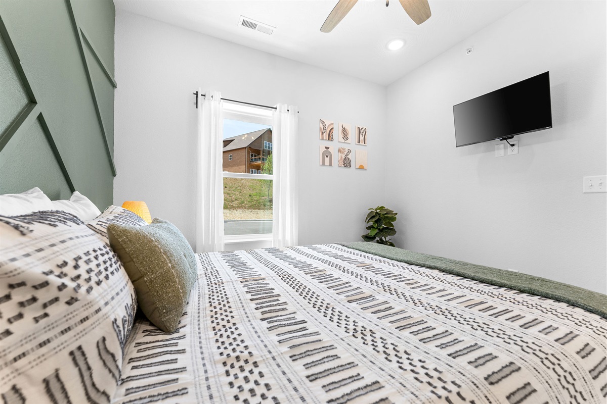 Main level king bedroom w/ ensuite bath