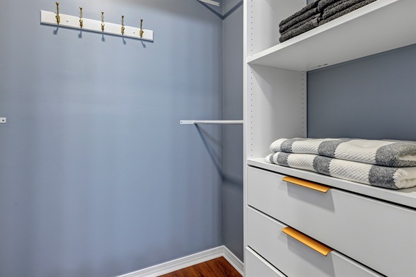 Walk in closet with plenty of storage