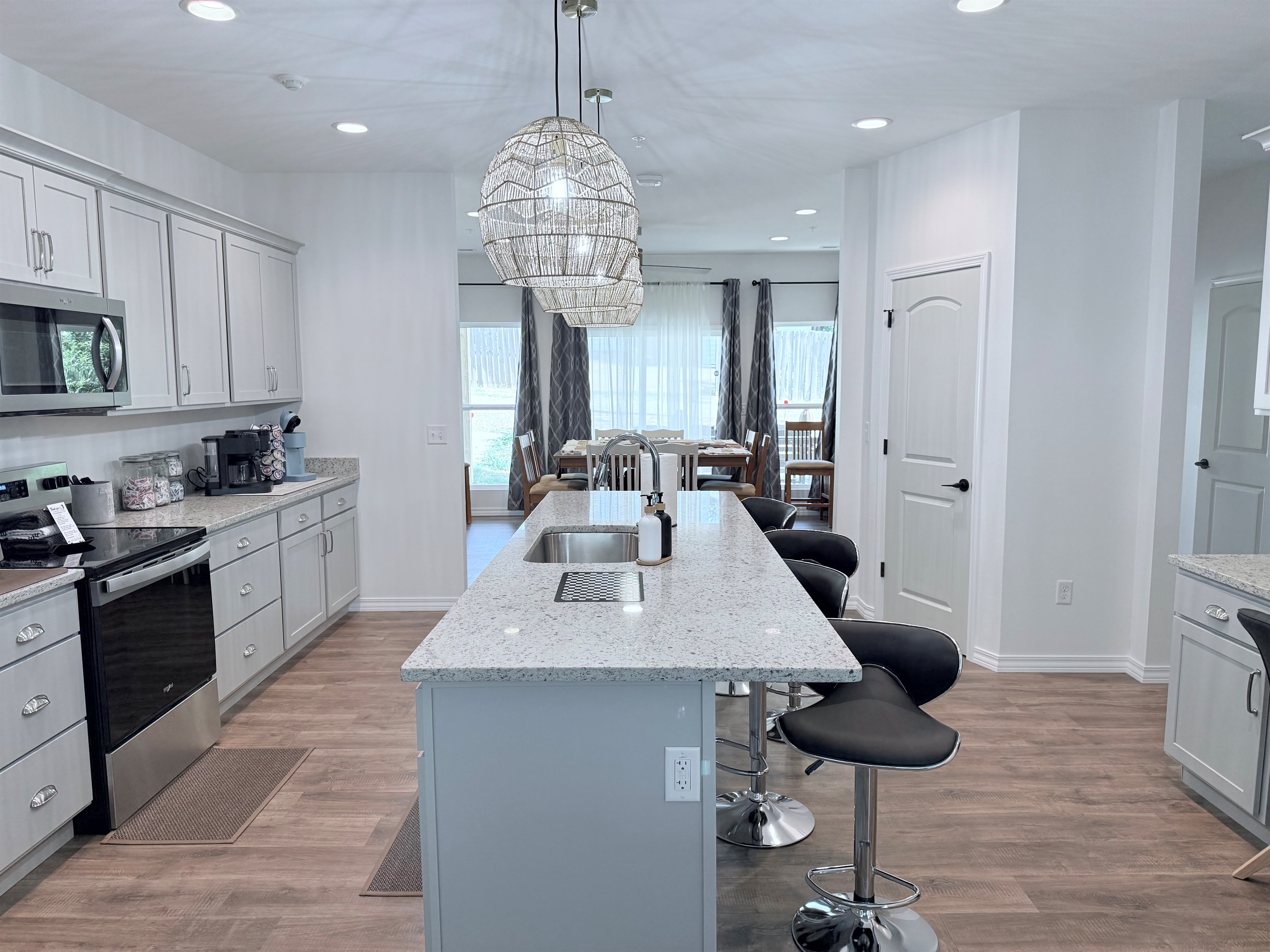 Huge gourmet kitchen is open to living room and dining room. Perfect for large gatherings.