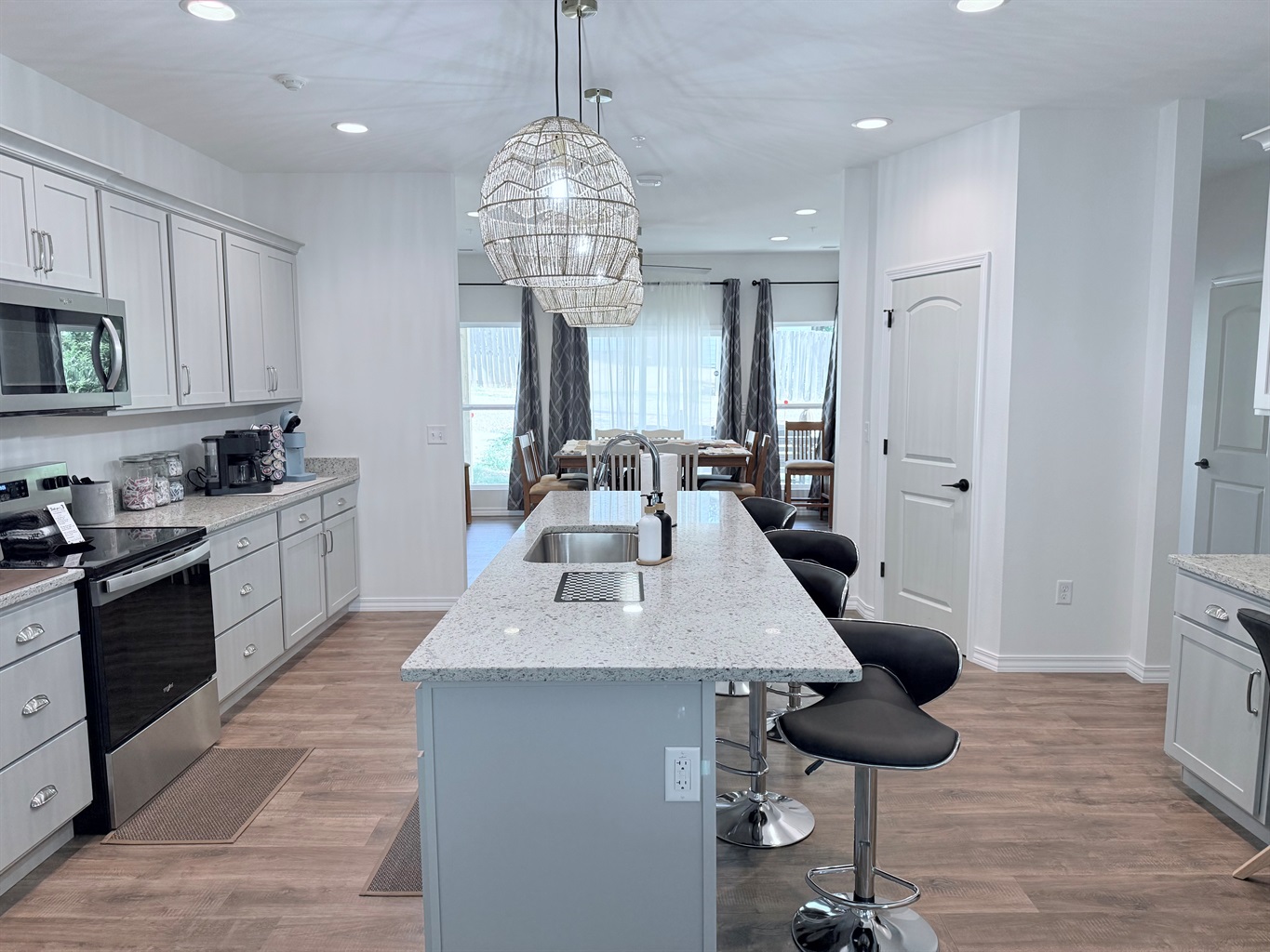 Huge gourmet kitchen is open to living room and dining room. Perfect for large gatherings.