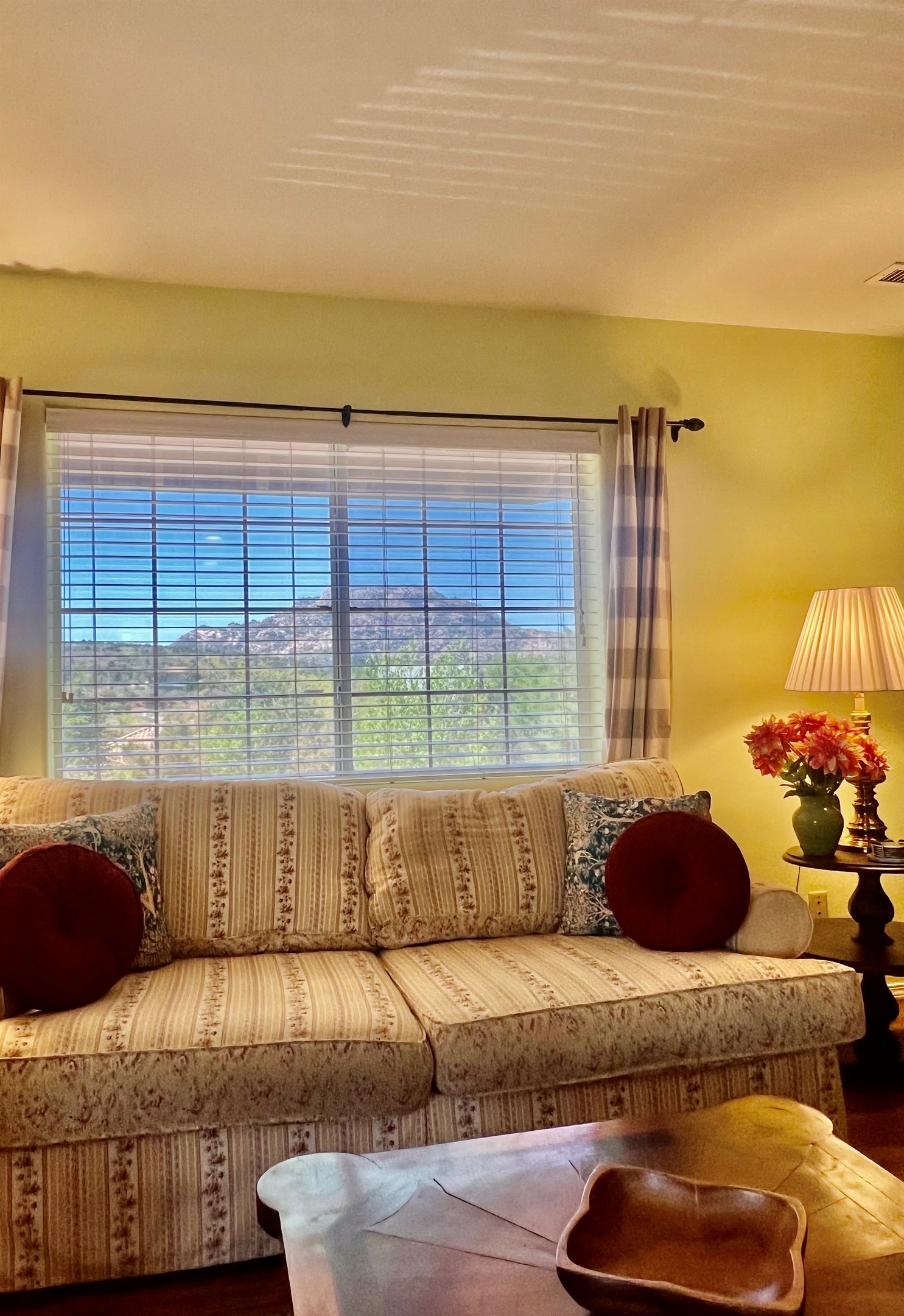 Sit back, relax and enjoy the views of Granite Mountain from the comfort of your living room