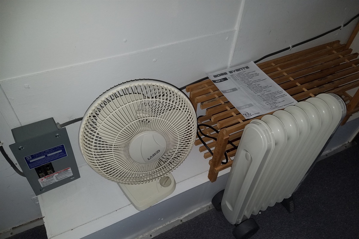 An AC, fan, and a radiant heater keeps the temperature comfortable.  Open the windows to enjoy the summer night breezes and fresh country air.