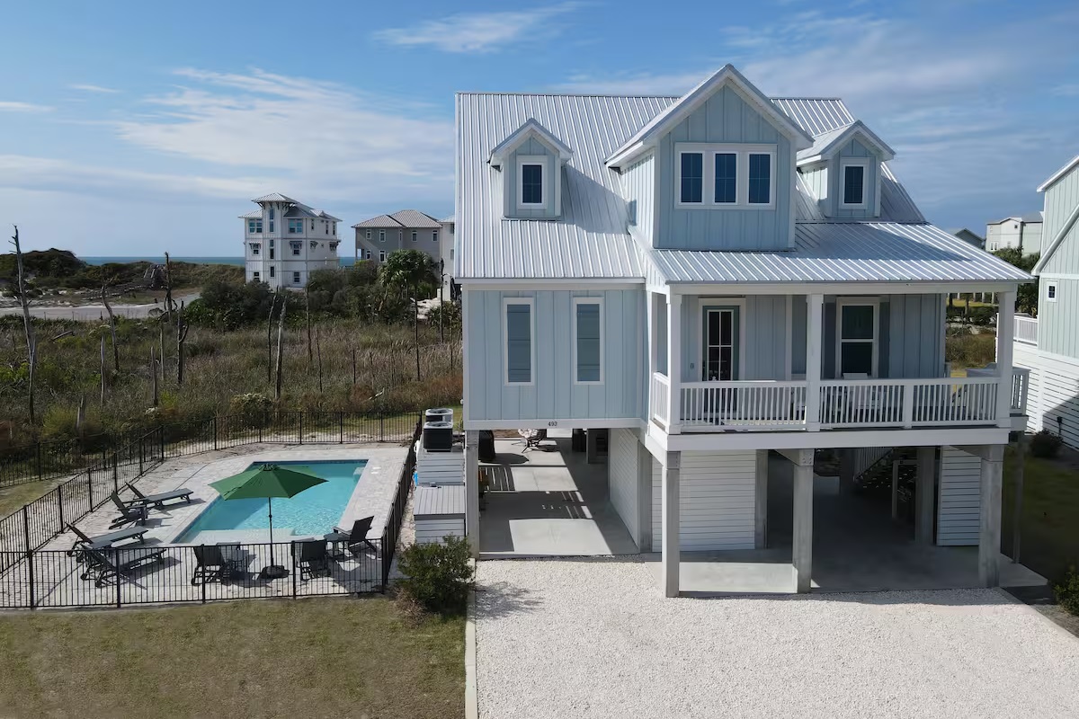Coastal elegance meets laid-back luxury in this stunning beach retreat, featuring a private pool, Gulf views, and just steps from the shoreline.