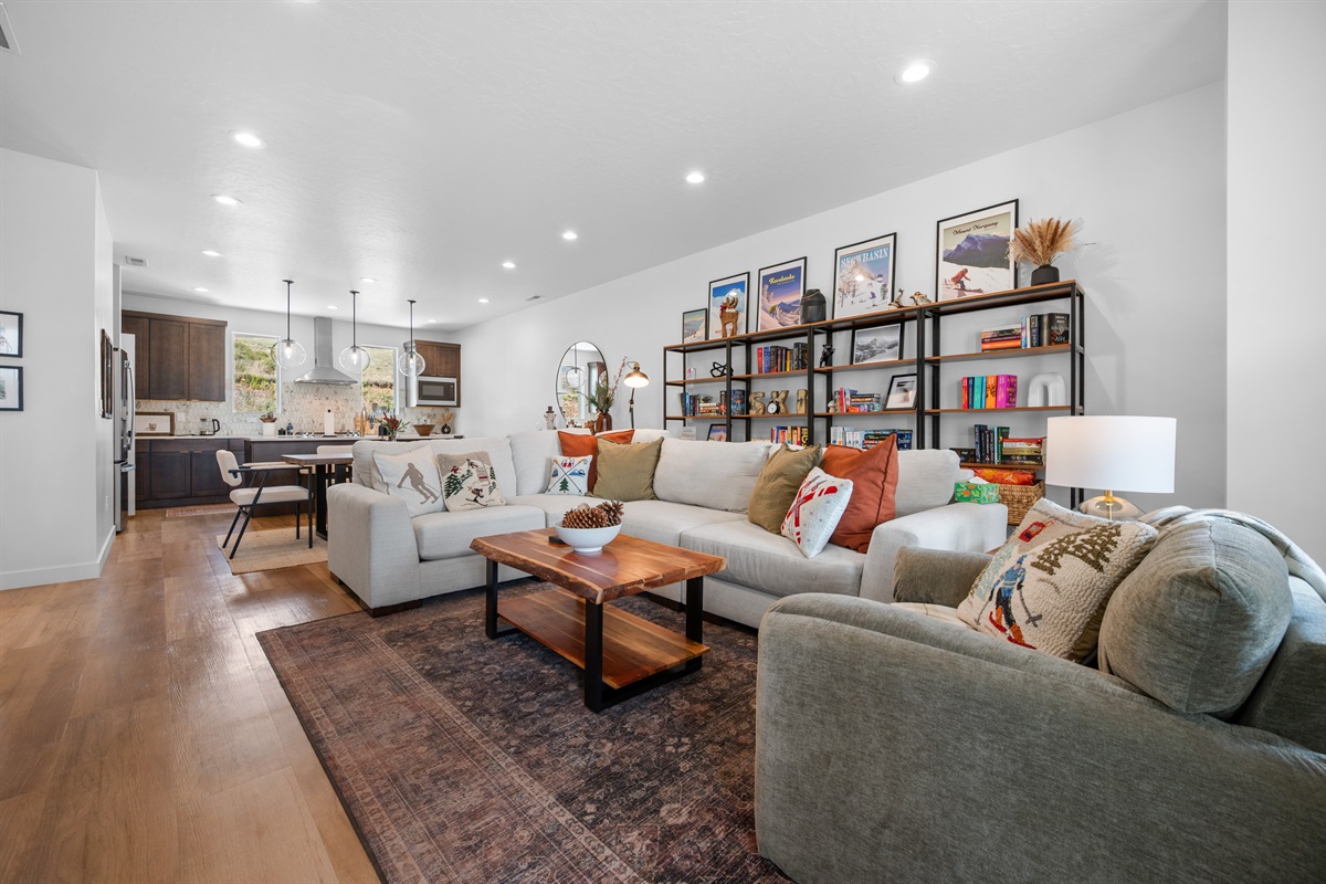 Spacious living area with comfortable seating and seamless flow into the kitchen.