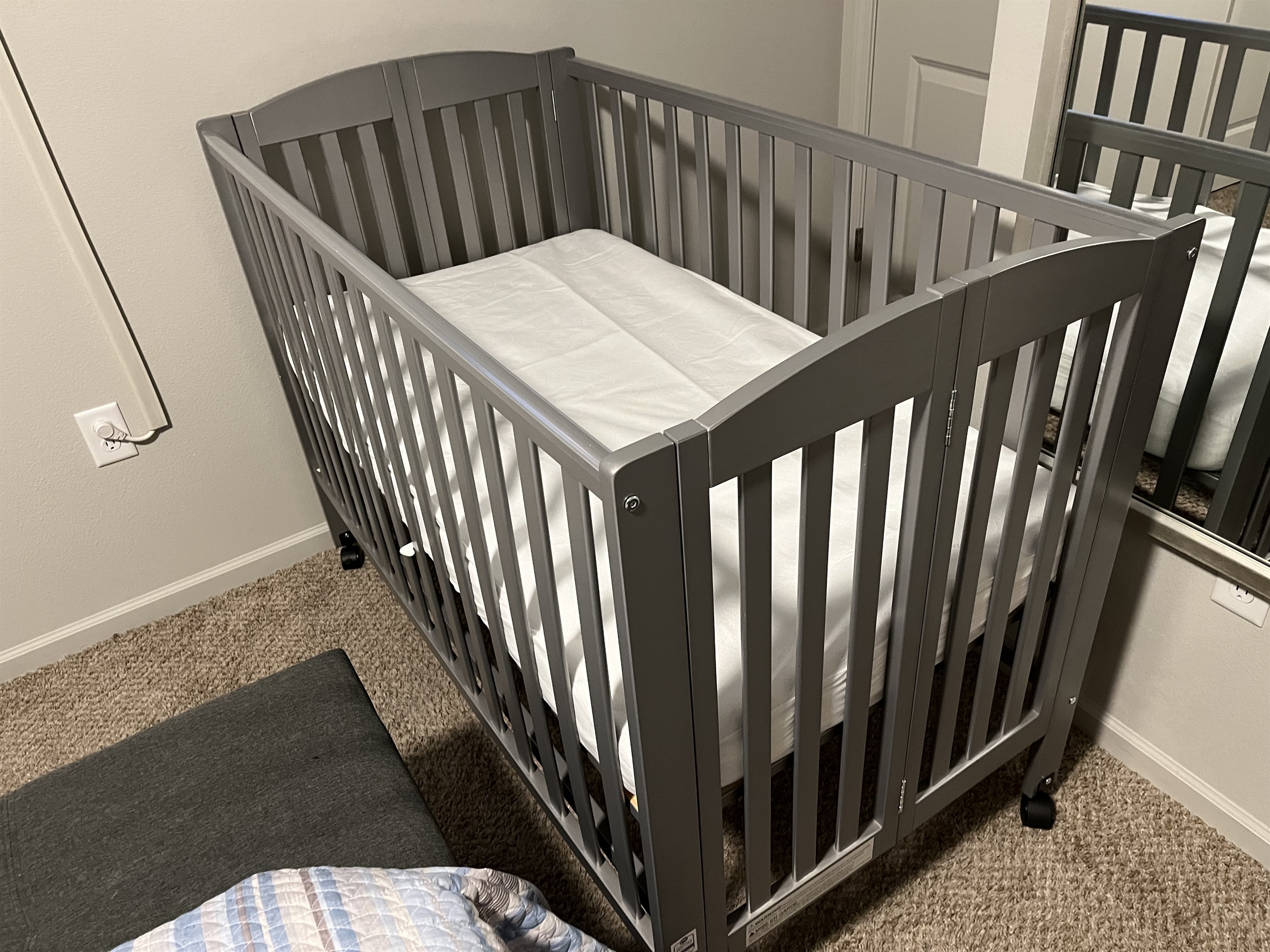 Crib provided for your little one. It is a travel model that folds. It is located in the master bedroom closet along with the mattress