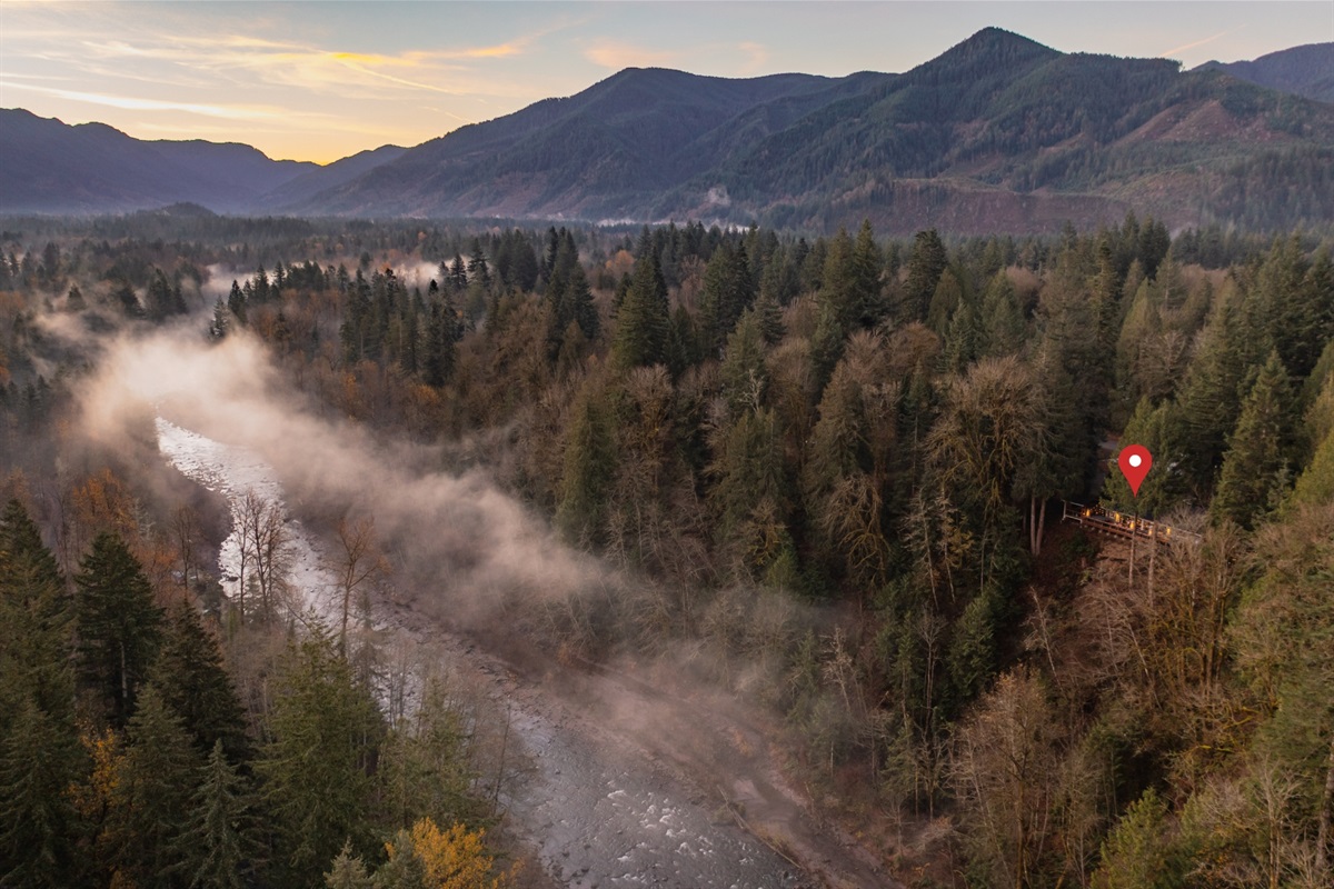 Wake up surrounded by misty river views and endless evergreens as the mountains rise around Emberwood Chalet—your private escape into Oregon’s wild beauty.