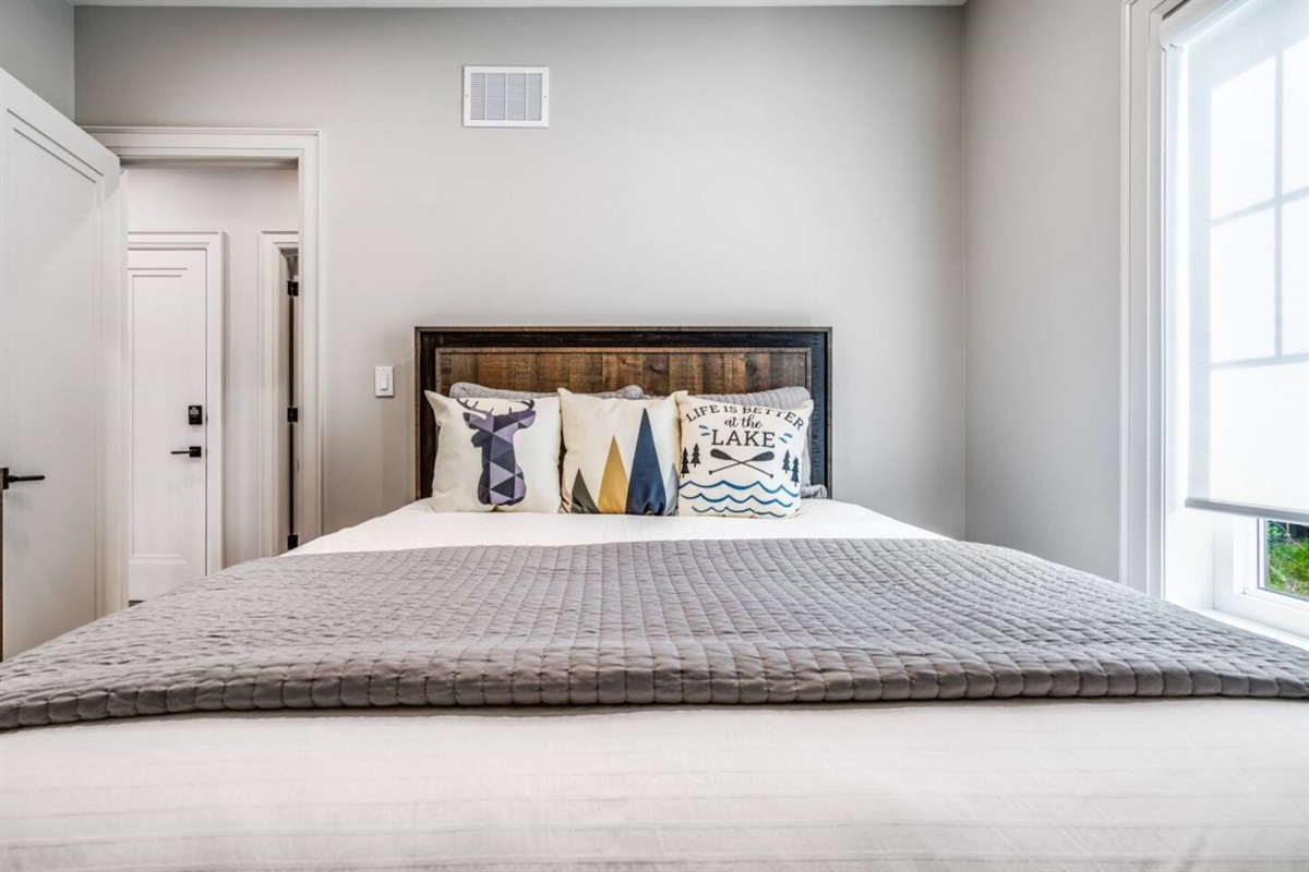 A peaceful queen retreat for restful nights and lazy mornings on the upper level.