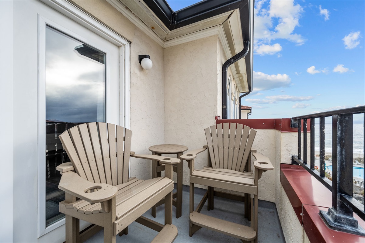 Private balcony with comfortable seating and beautiful ocean views
