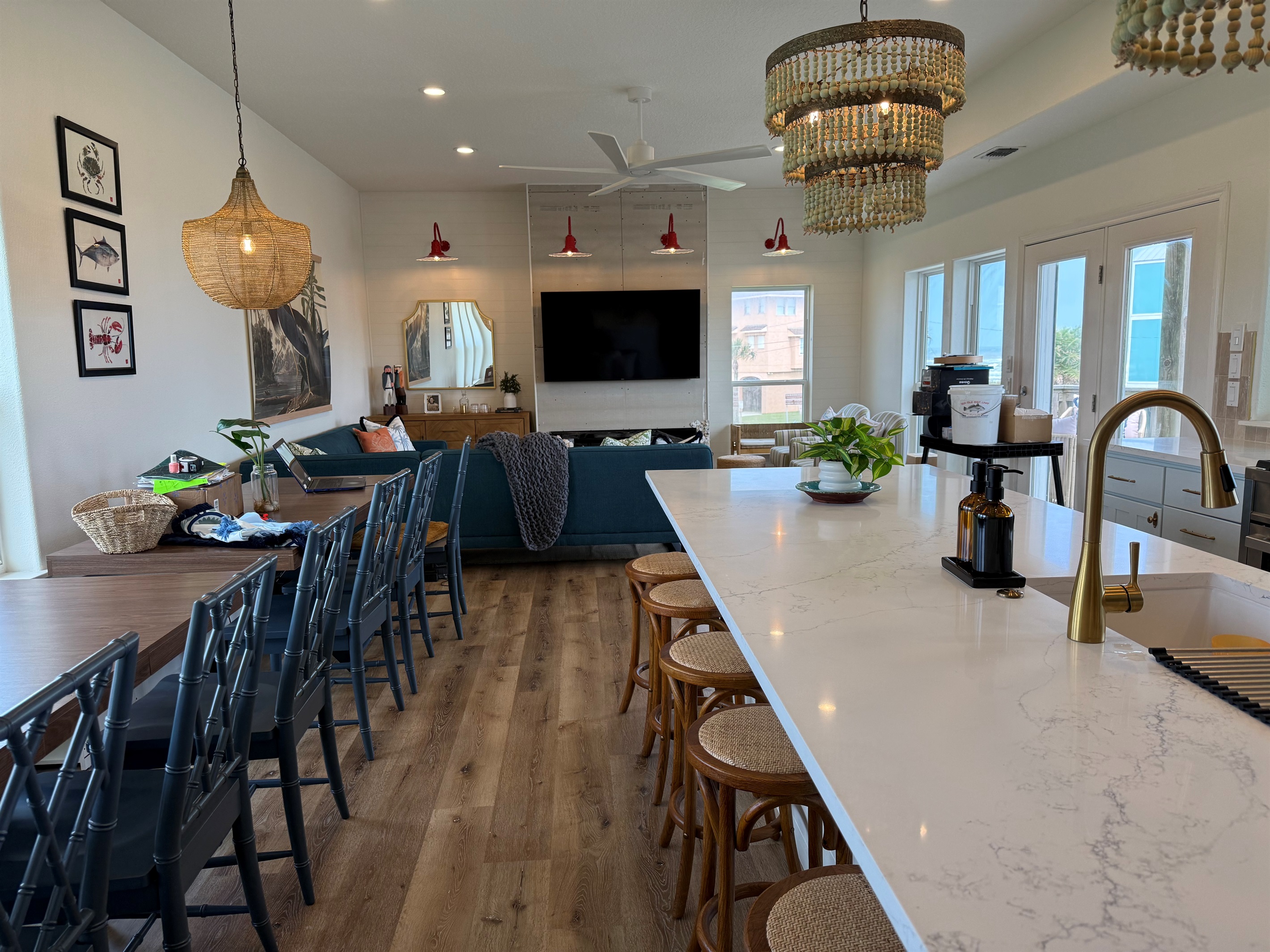 Dinner Tables seats 12-13, and the island barstools add 6 more seats. Great for family meal time. 