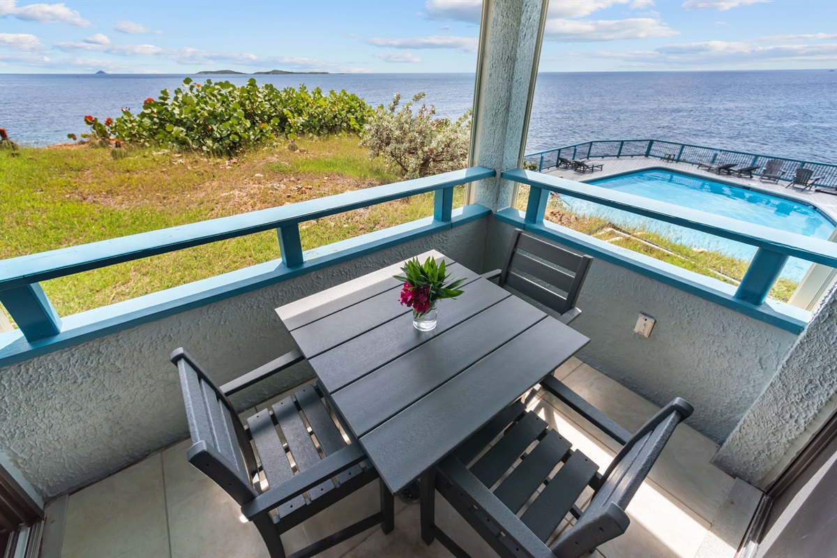Walk from your bedroom to the balcony that have open views of the sea and the pool