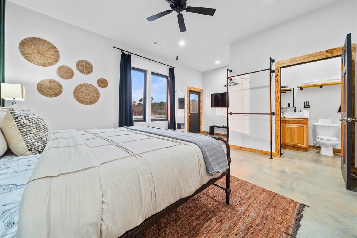 With its cozy layout and comfortable furnishings, this bedroom is perfect for recharging after a busy day.