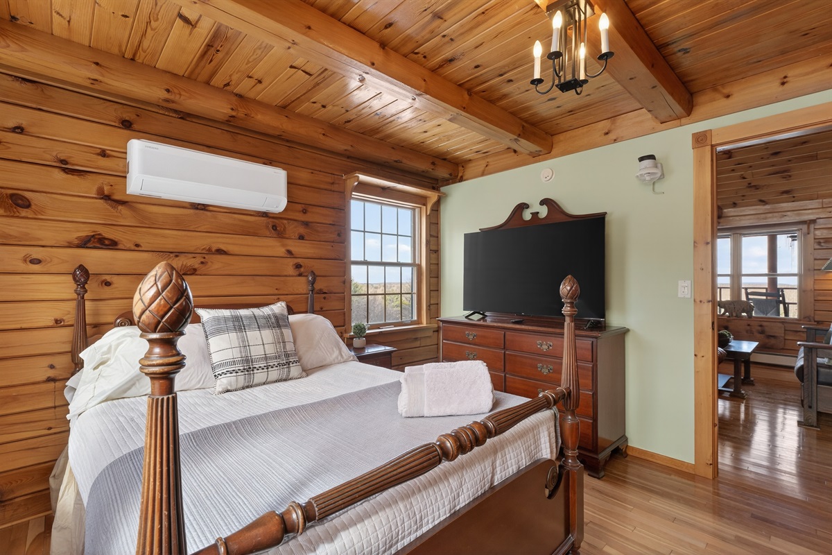 Main floor Queen bedroom with access to shared bathroom