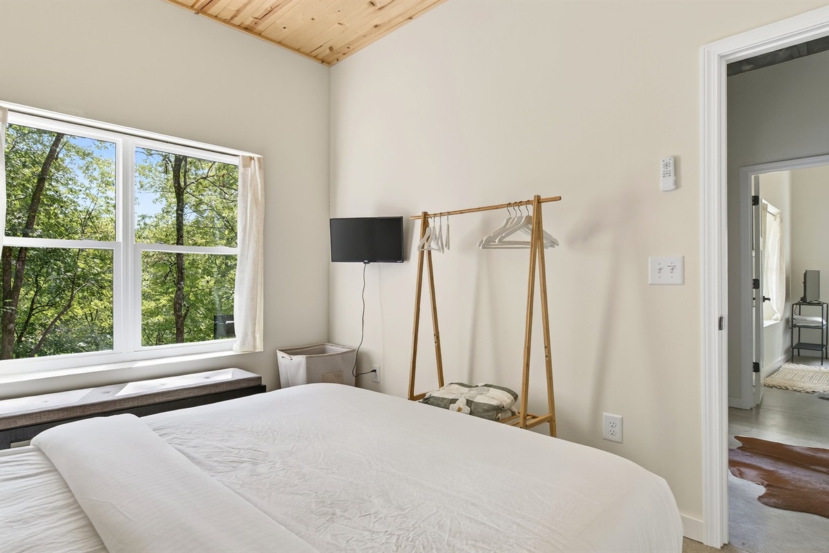 The 3rd bedroom has a TV on the wall