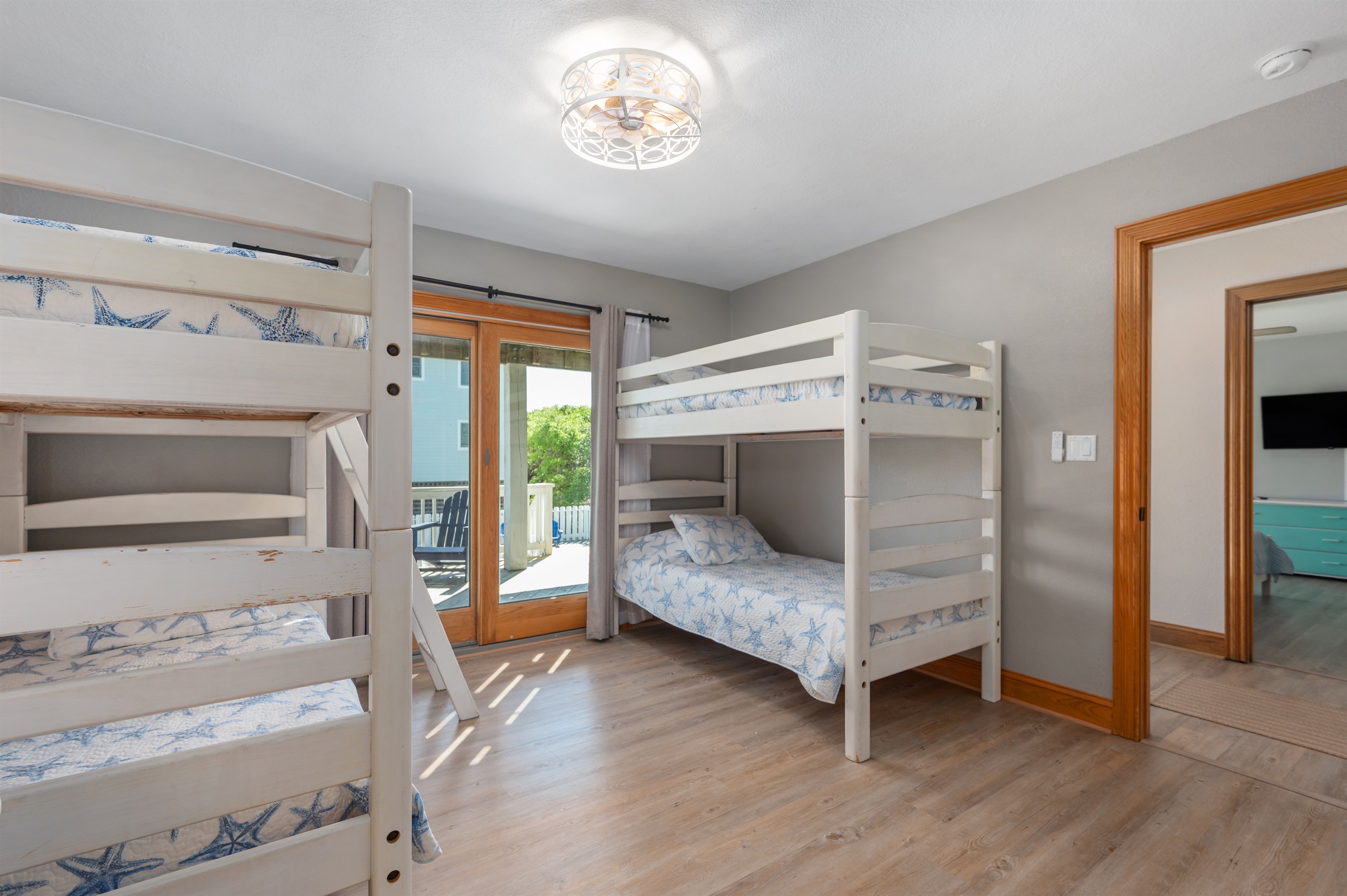 Spacious bunk room offering plenty of sleeping space for kids, teens, or larger groups.