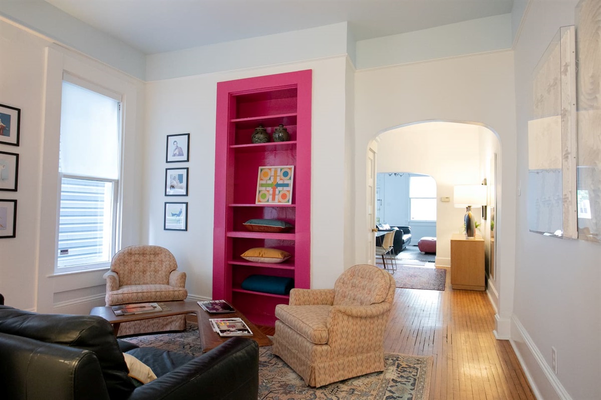 Den (second living room) ~ cozy, design-forward lounge created for conversation and slow moments — comfortable seating, curated books and games, and a relaxed, unplugged atmosphere.