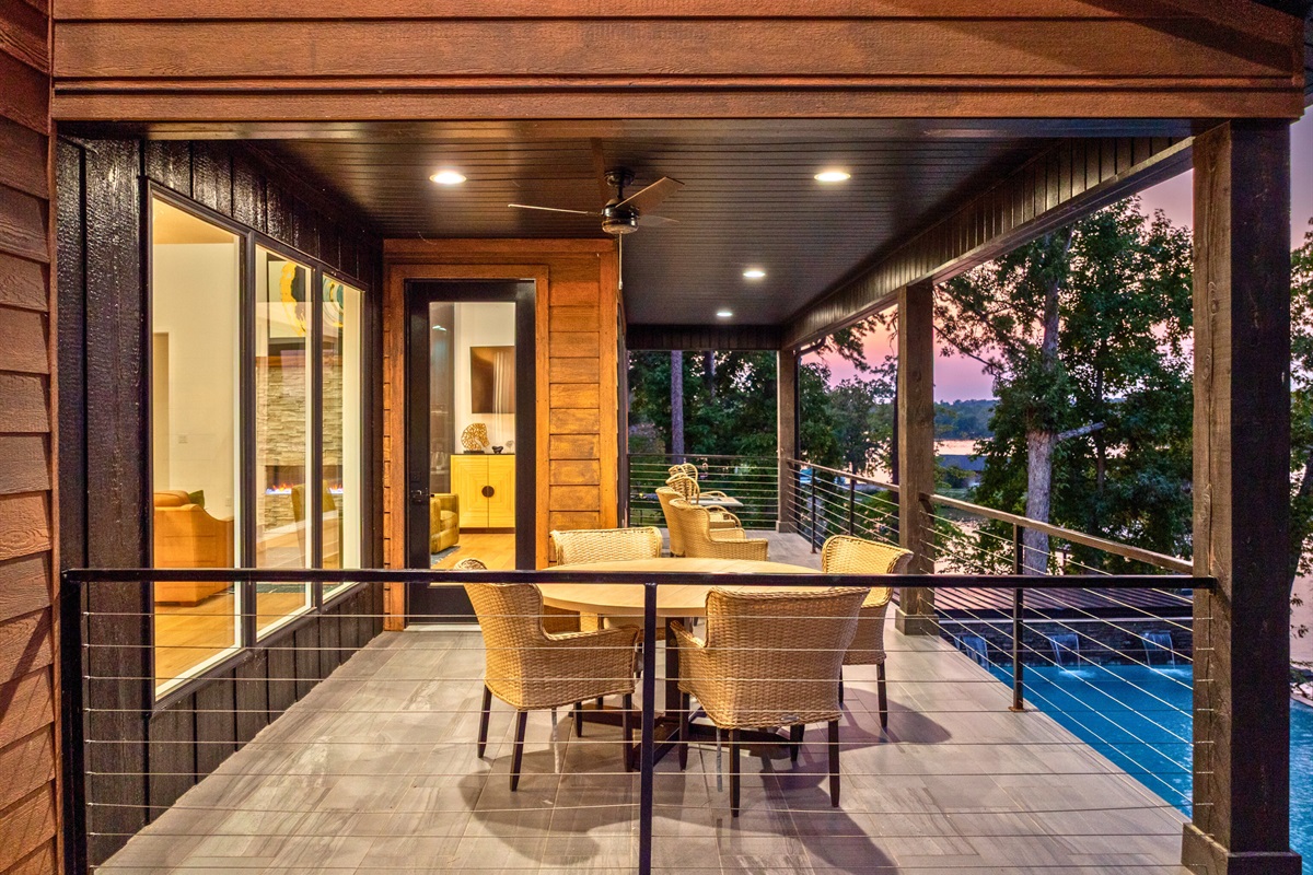 Indoor-outdoor living flows seamlessly in this lakeside dining space.
